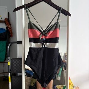 BECCA one piece swimsuit in Pink, Black, and White